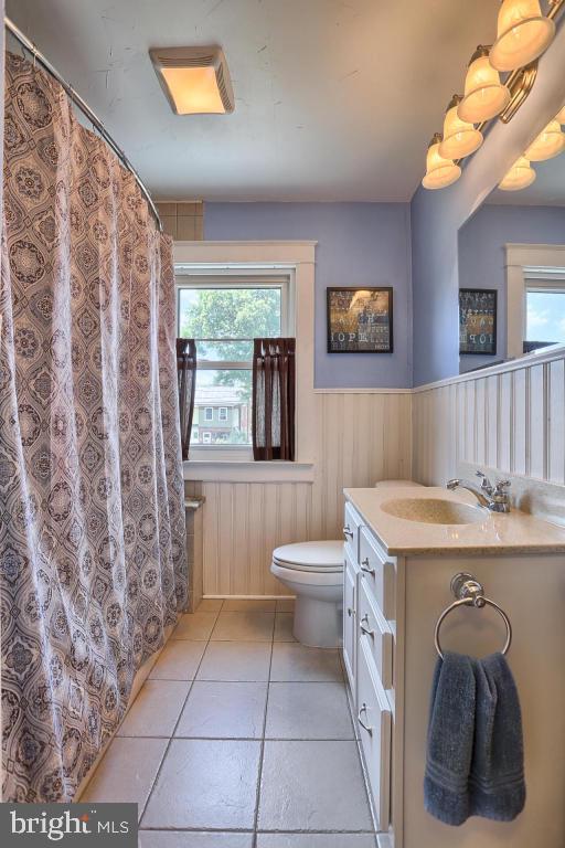 306 East New Street Lititz, PA 17543 - Photo 25 of 31 a bathroom with a sink a toilet and a mirror