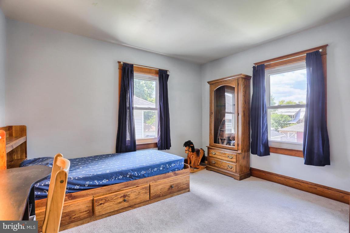 306 East New Street Lititz, PA 17543 - Photo 26 of 31 a living room with furniture pool and a window