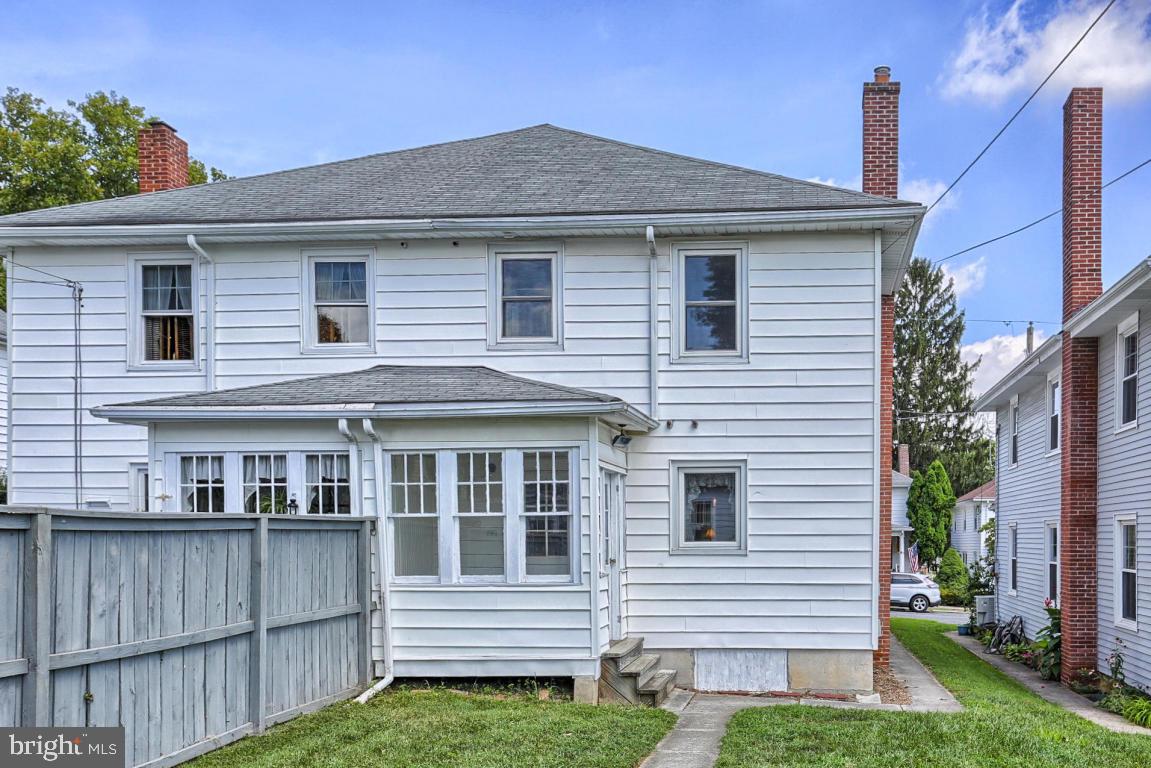 306 East New Street Lititz, PA 17543 - Photo 8 of 31 a view of a house with a yard