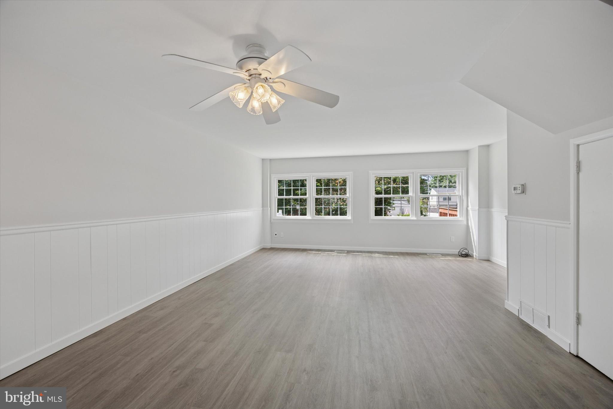 12136 Sweet Briar Road Philadelphia, PA 19154 - Photo 10 of 33 wooden floor in an empty room with a window