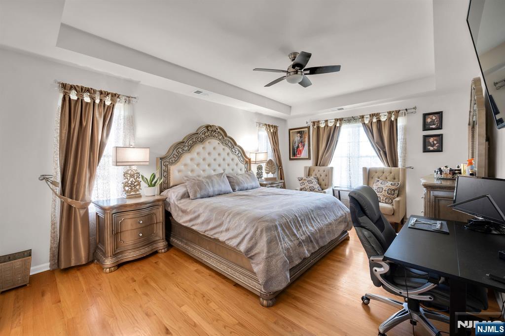 6 Jacob Way Phillipsburg, NJ 08865 - Photo 17 of 38 a bedroom with a bed wooden floor and window