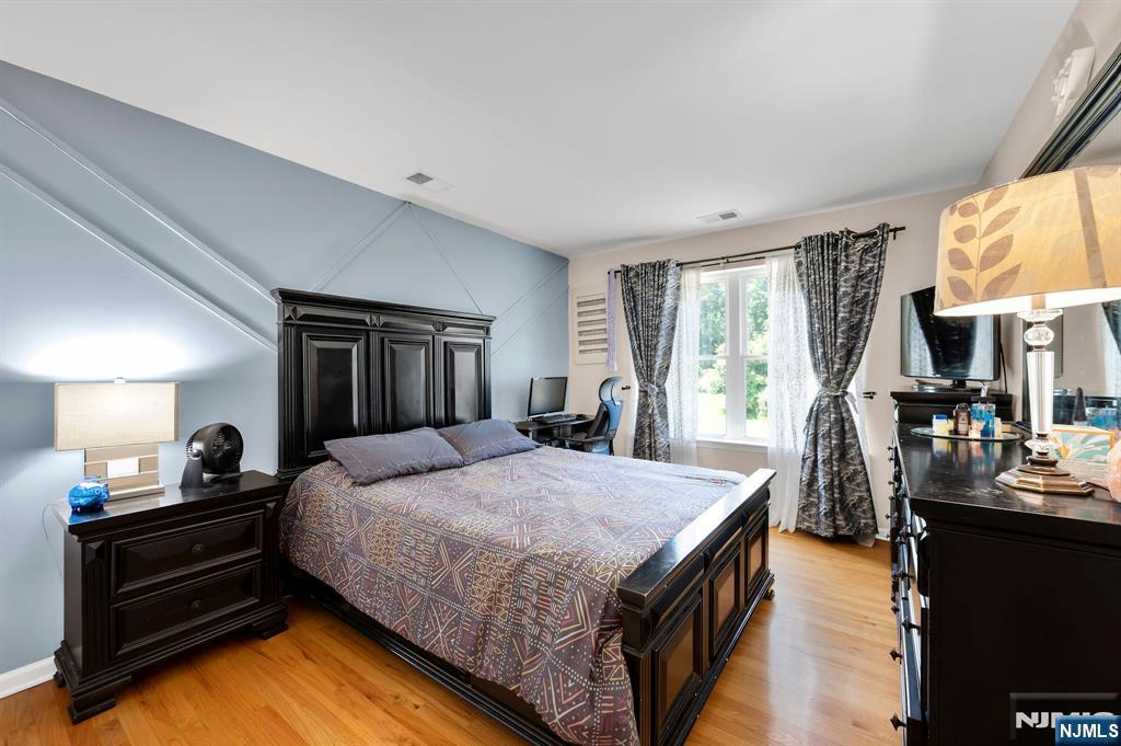 6 Jacob Way Phillipsburg, NJ 08865 - Photo 24 of 38 a bedroom with a bed and large windows