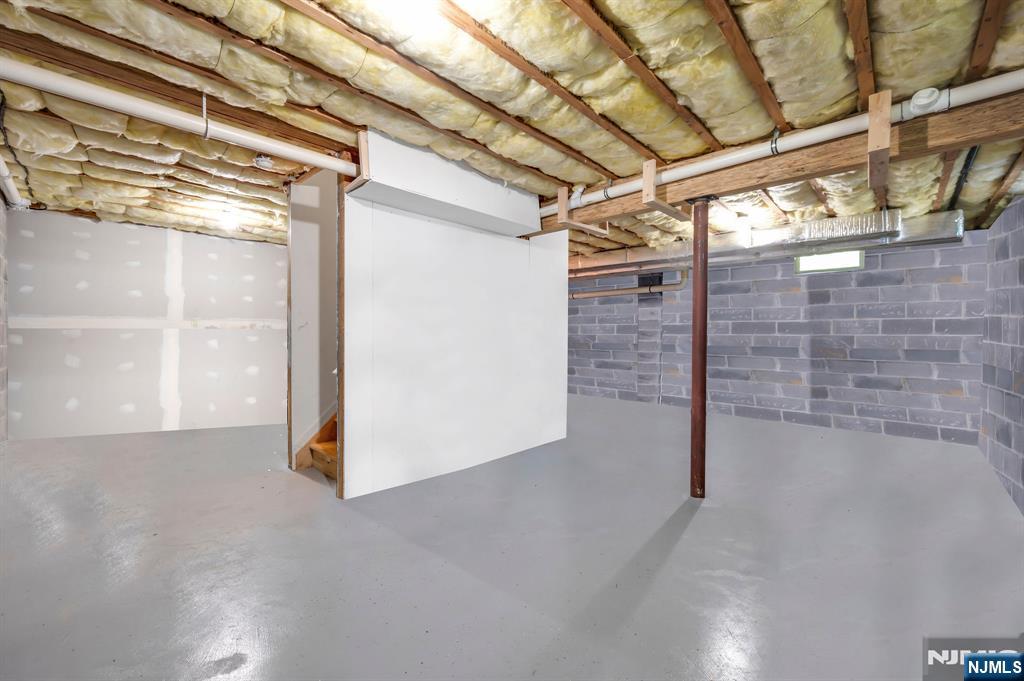 6 Jacob Way Phillipsburg, NJ 08865 - Photo 30 of 38 a view of a room with racks on the wall