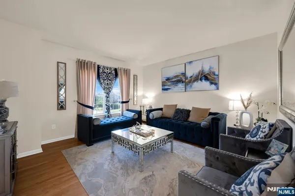 a living room with furniture and a table