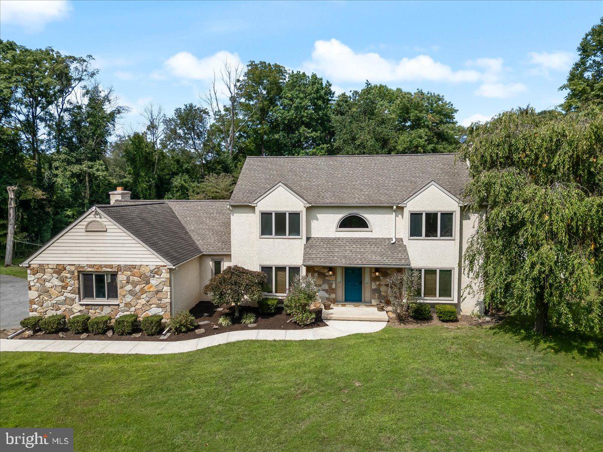 336 Howarth Road Media, PA 19063 - Photo 2 of 61 a aerial view of a house with swimming pool and sitting area