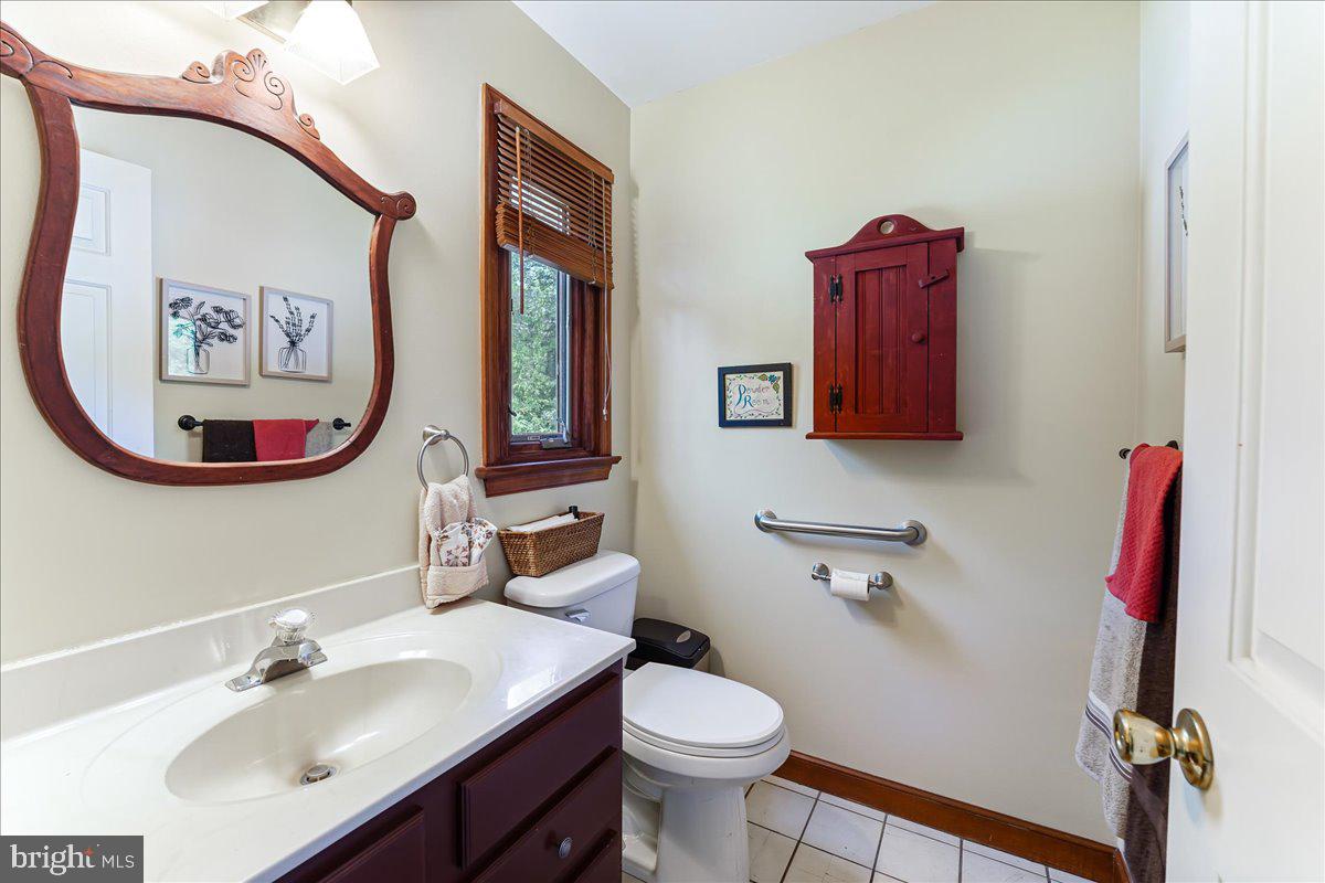 336 Howarth Road Media, PA 19063 - Photo 23 of 61 a bathroom with a sink and a mirror