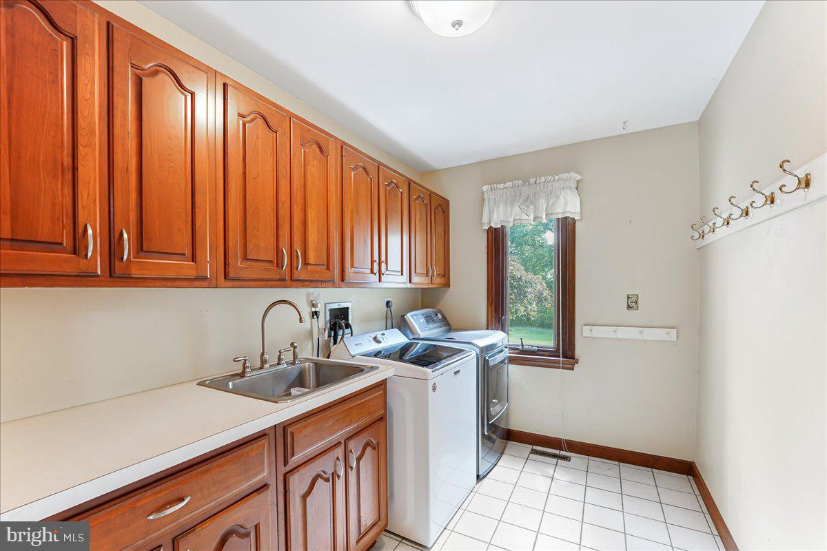 336 Howarth Road Media, PA 19063 - Photo 24 of 61 a kitchen with a sink cabinets and window
