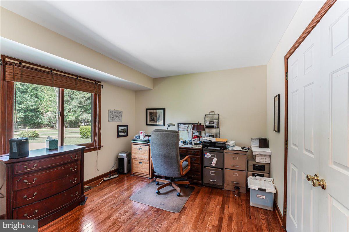 336 Howarth Road Media, PA 19063 - Photo 26 of 61 a view of a workspace with furniture and a window