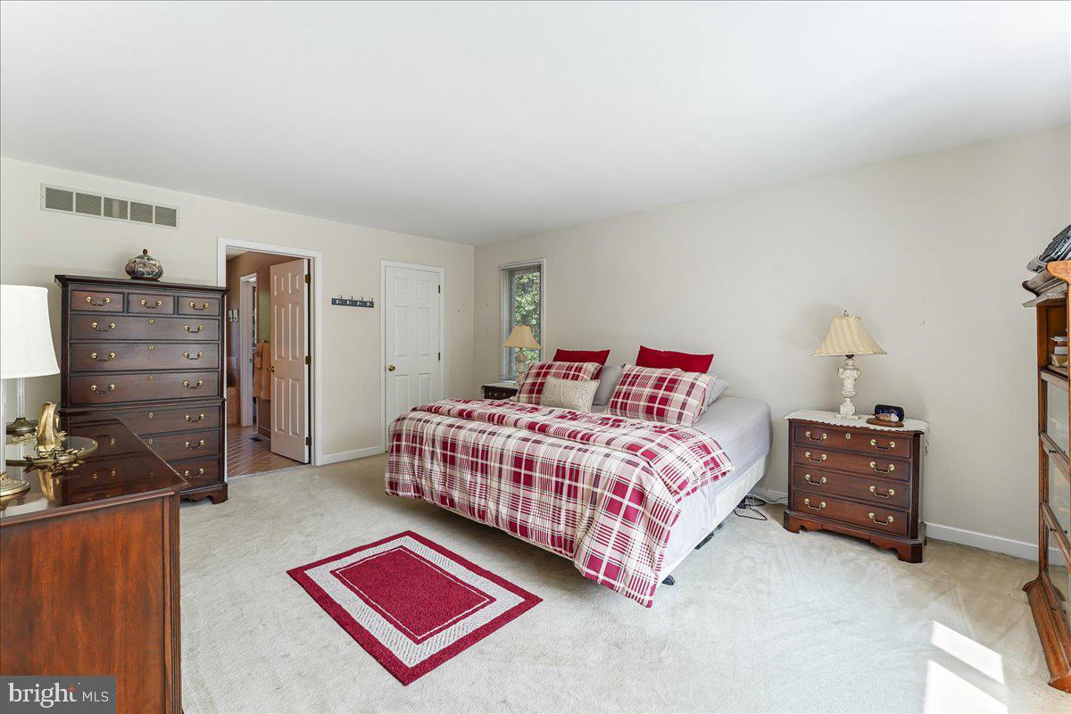 336 Howarth Road Media, PA 19063 - Photo 29 of 61 a bedroom with a bed and dresser