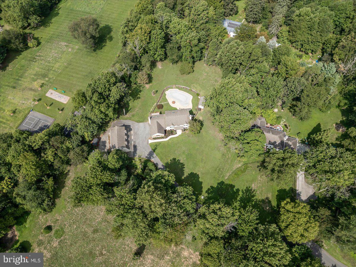 336 Howarth Road Media, PA 19063 - Photo 42 of 61 an aerial view of a house with a yard and large tree