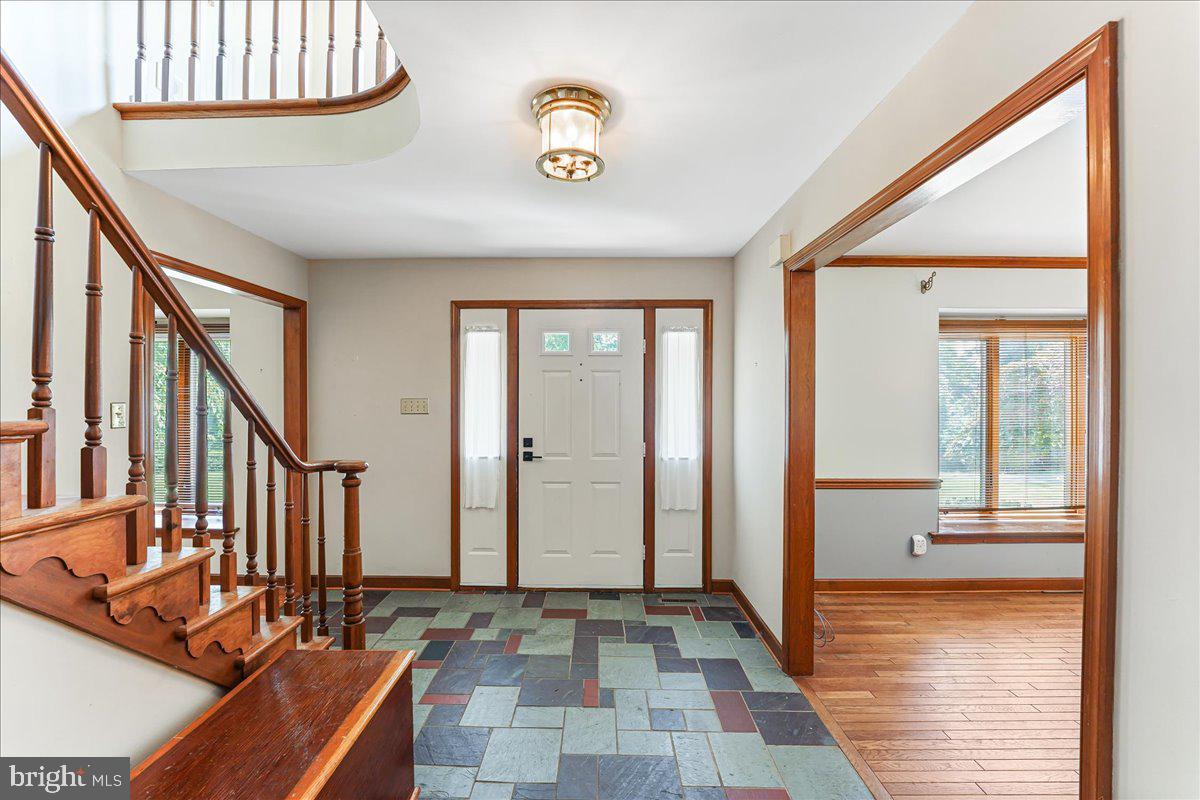 336 Howarth Road Media, PA 19063 - Photo 5 of 61 a view of an entryway with wooden floor and windows