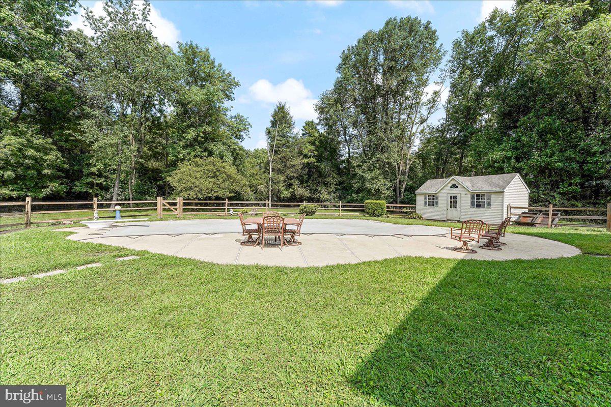 336 Howarth Road Media, PA 19063 - Photo 51 of 61 a view of pool with lawn chairs and large trees