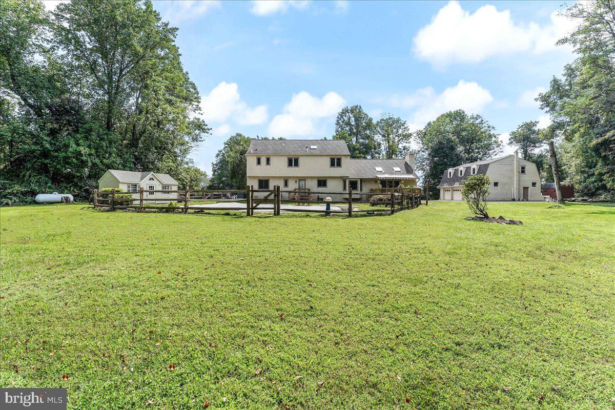 336 Howarth Road Media, PA 19063 - Photo 52 of 61 a view of a swimming pool with a yard