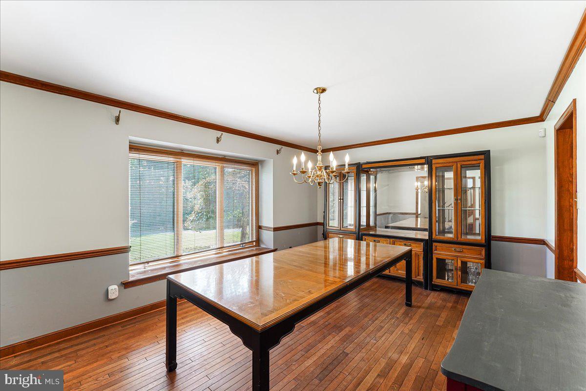 336 Howarth Road Media, PA 19063 - Photo 7 of 61 a view of a room with furniture wooden floor and window