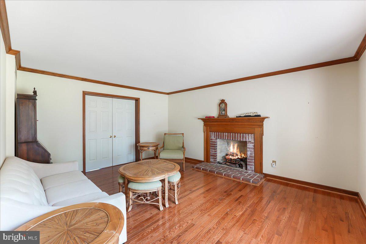 336 Howarth Road Media, PA 19063 - Photo 10 of 61 a living room with furniture and a fireplace