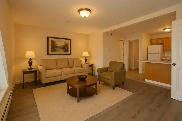 a living room with furniture and a window