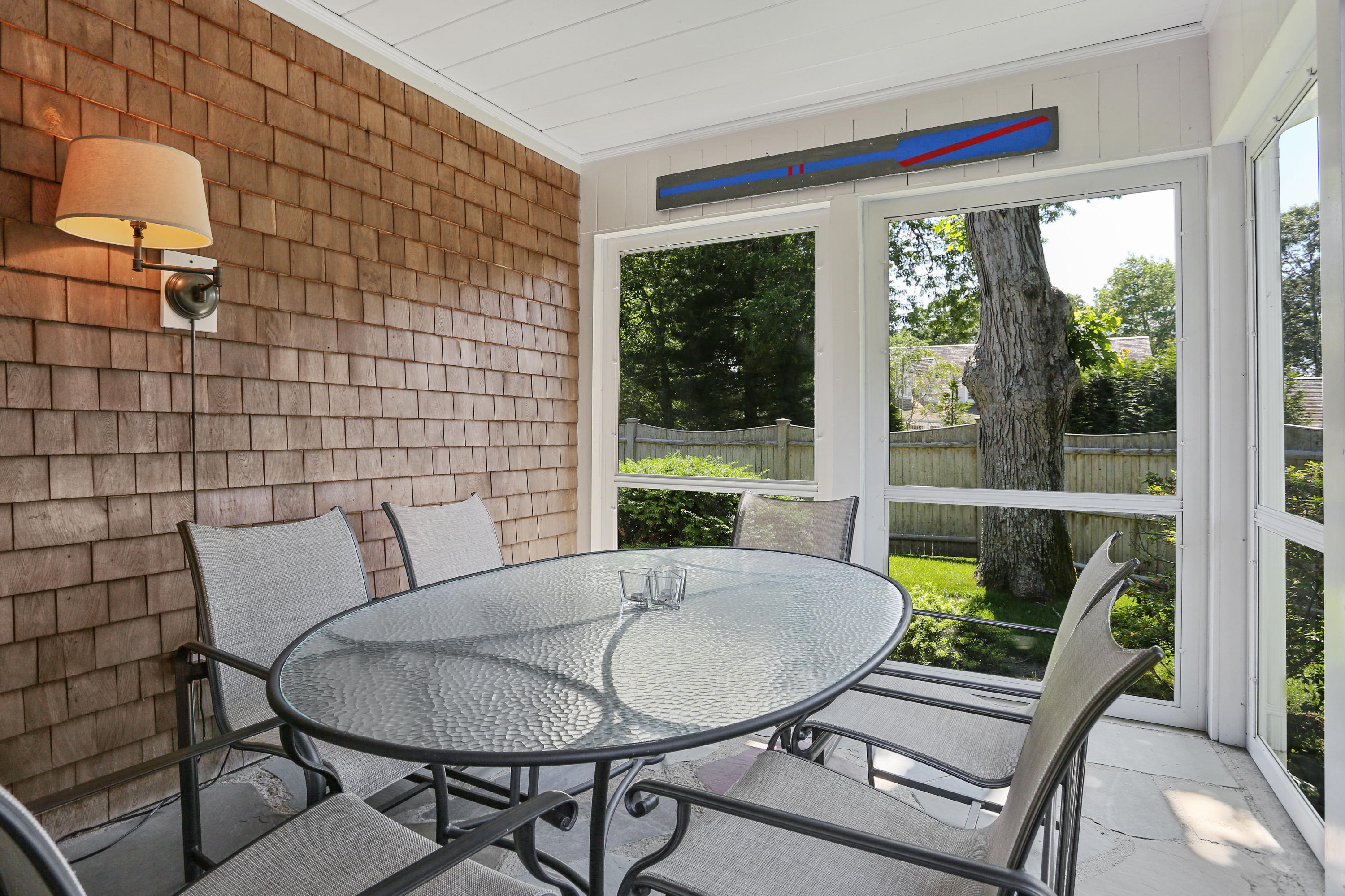 256 Parker Road Osterville, MA 02655 - Photo 7 of 22 a view of a dining room with furniture window and outside view