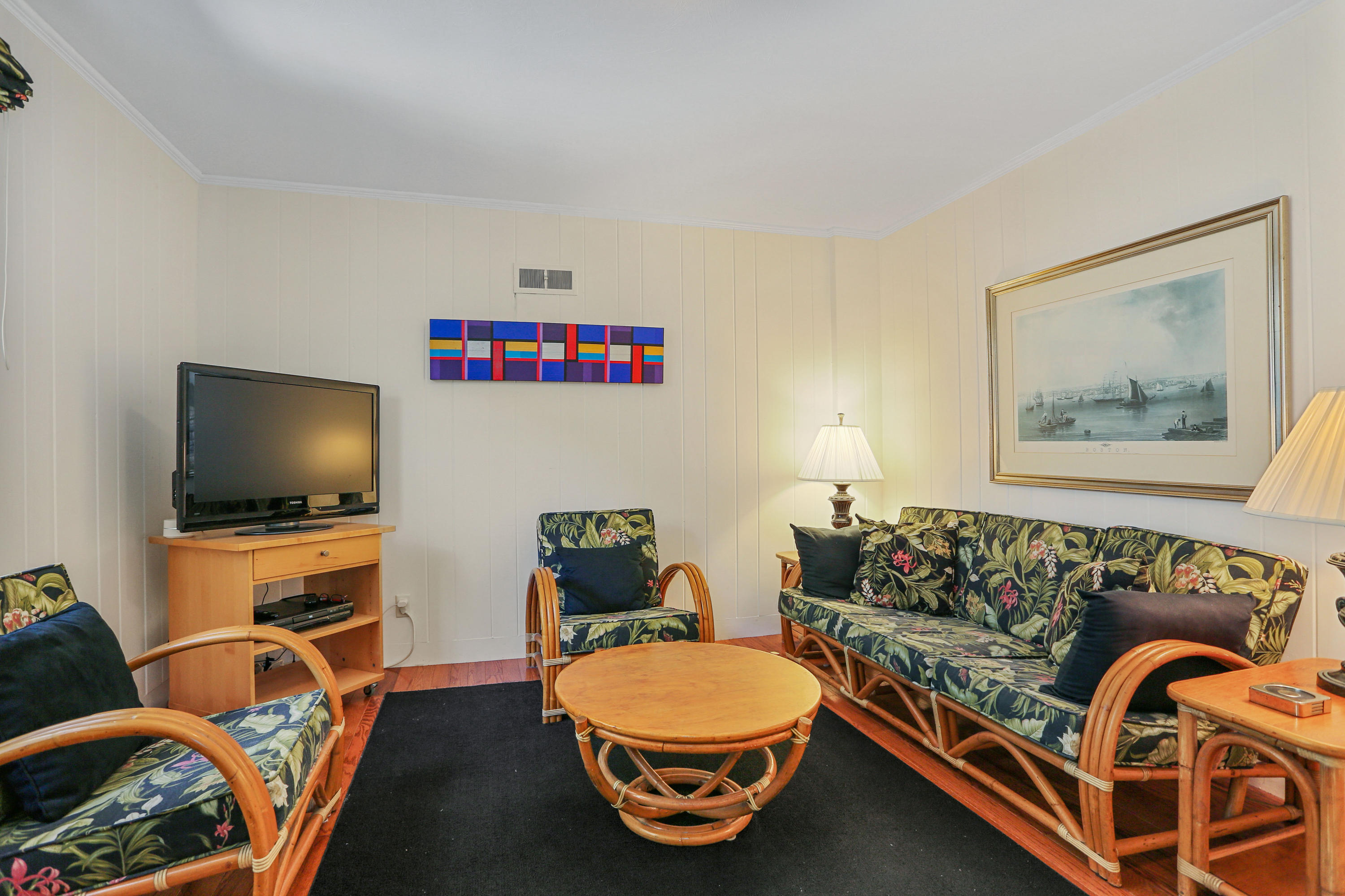 256 Parker Road Osterville, MA 02655 - Photo 8 of 22 a living room with furniture and a flat screen tv