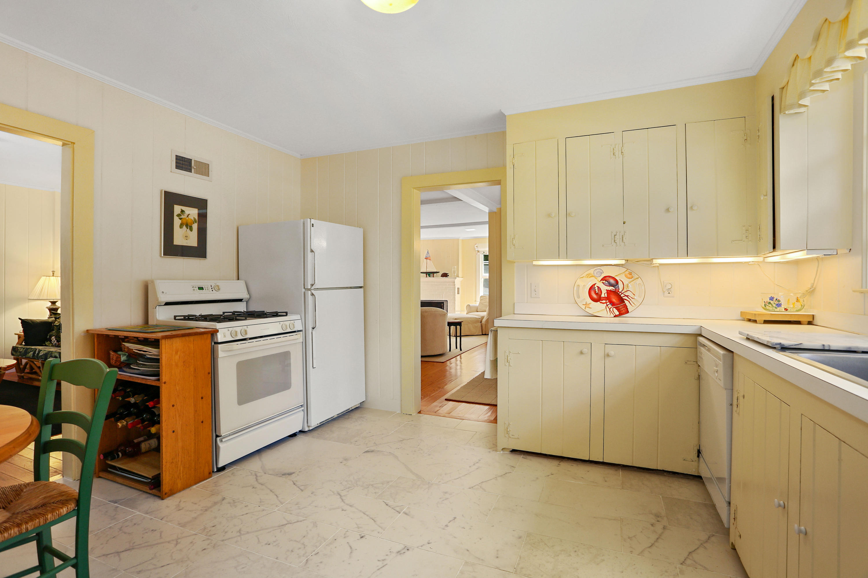 256 Parker Road Osterville, MA 02655 - Photo 10 of 22 a utility room with cabinets washer and dryer