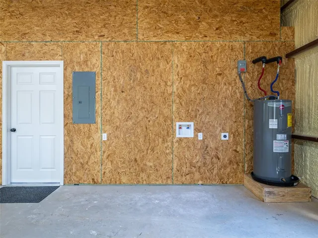 a view of an empty room with a fireplace