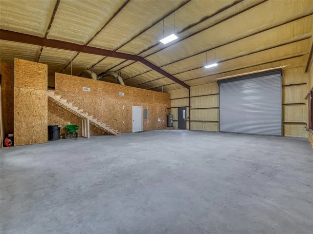 a view of a brick house with an outdoor space