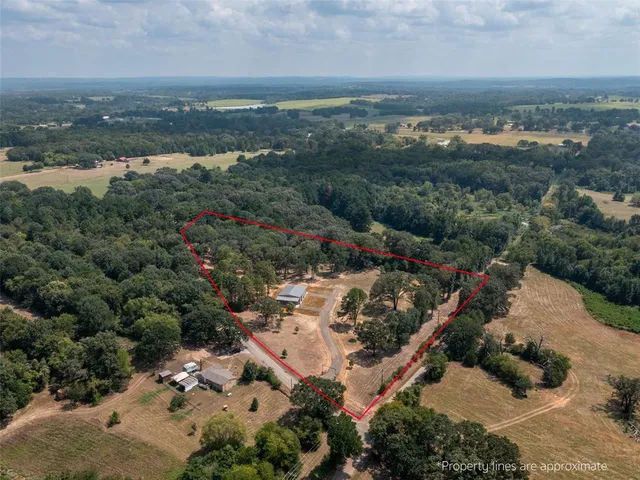 an aerial view of city and lake