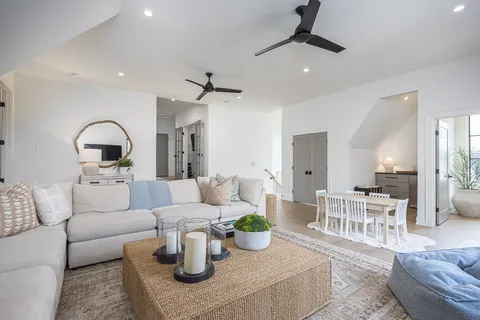 a bedroom with bed and a table