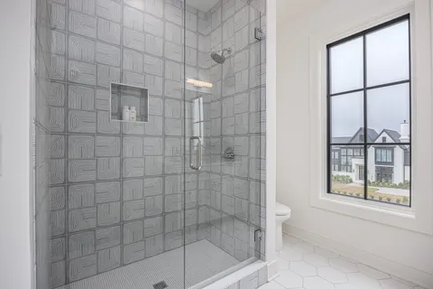 a kitchen with a sink and a large window