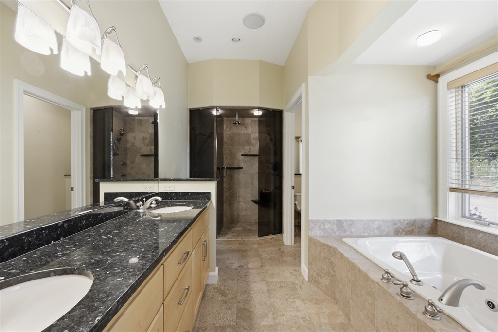 33 Labrie Lane Holyoke, MA 01040 - Photo 14 of 42 a bathroom with a granite countertop tub sink and mirror
