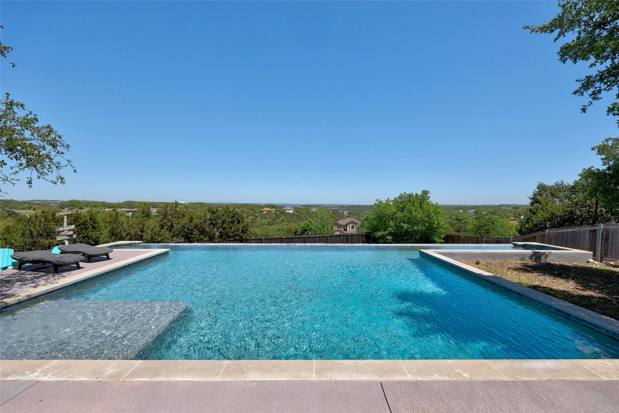 20117 Haystack Cove Spicewood, TX 78669 - Photo 1 of 40 Imagine swimming with THIS as your view! Get ready to make a lifetime of memories with your friends and family.