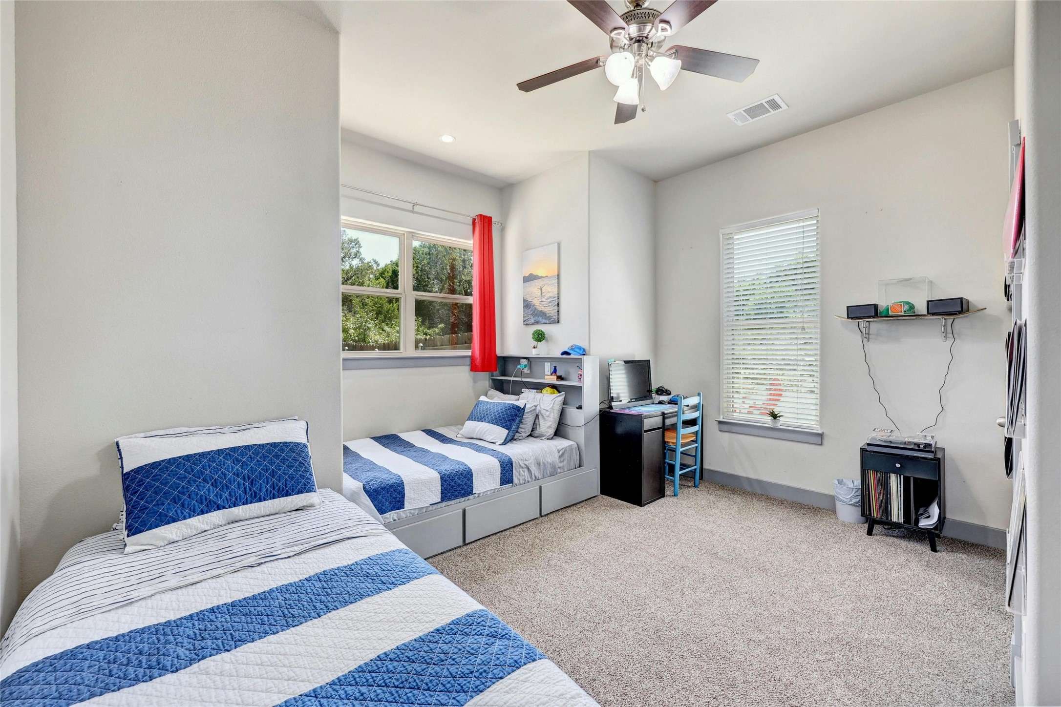 20117 Haystack Cove Spicewood, TX 78669 - Photo 22 of 40 One of three oversized guest or kid bedrooms on the main floor.