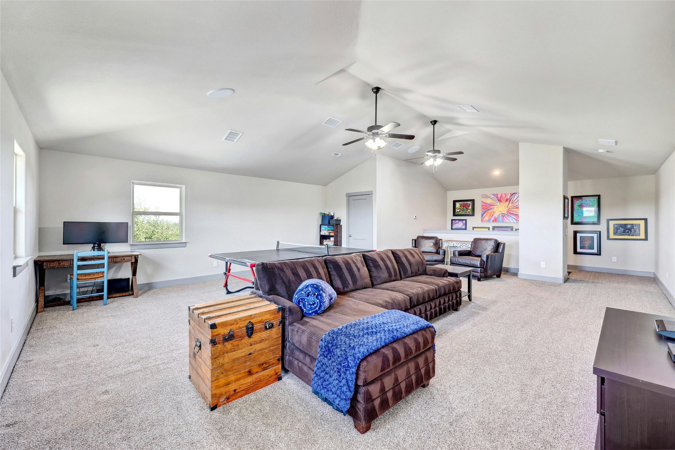 20117 Haystack Cove Spicewood, TX 78669 - Photo 26 of 40 This secondary living space is the perfect spot for teens or guests to have some privacy.