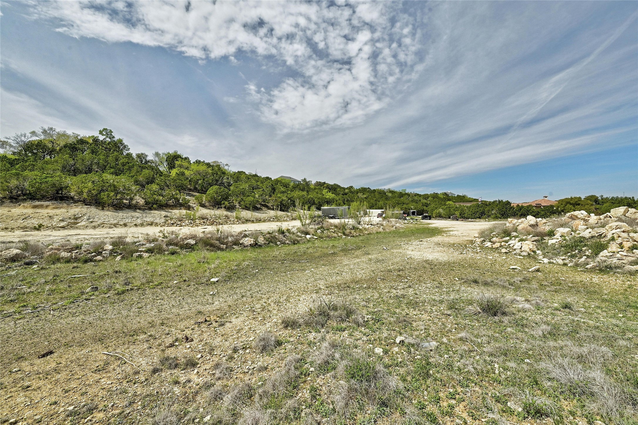 20117 Haystack Cove Spicewood, TX 78669 - Photo 28 of 40 This vantage point shows some of your 3+ acres and the places you can store grown-up toys, raise chickens, or let your imagination run wild! All of this 3+ acres is very usable and accessible.