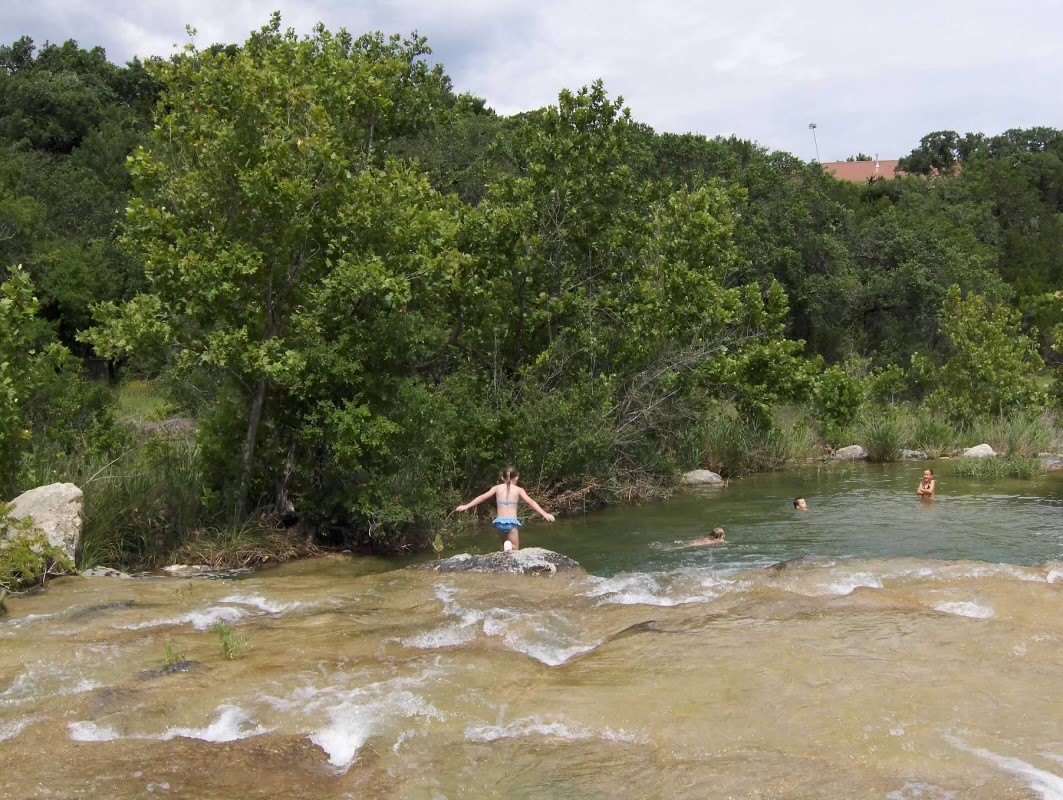 20117 Haystack Cove Spicewood, TX 78669 - Photo 39 of 40 Just a couple minutes away is this natural wonder. There are two swimming holes that are part of the HOA amenities.
