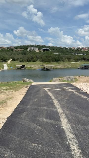 20117 Haystack Cove Spicewood, TX 78669 - Photo 40 of 40 Travis Settlement offers a privately GATED BOAT ramp and private waterfront park only for Travis Settlement homeowners. Travis Settlement also offers homeowners the ability to store their boat on their property.