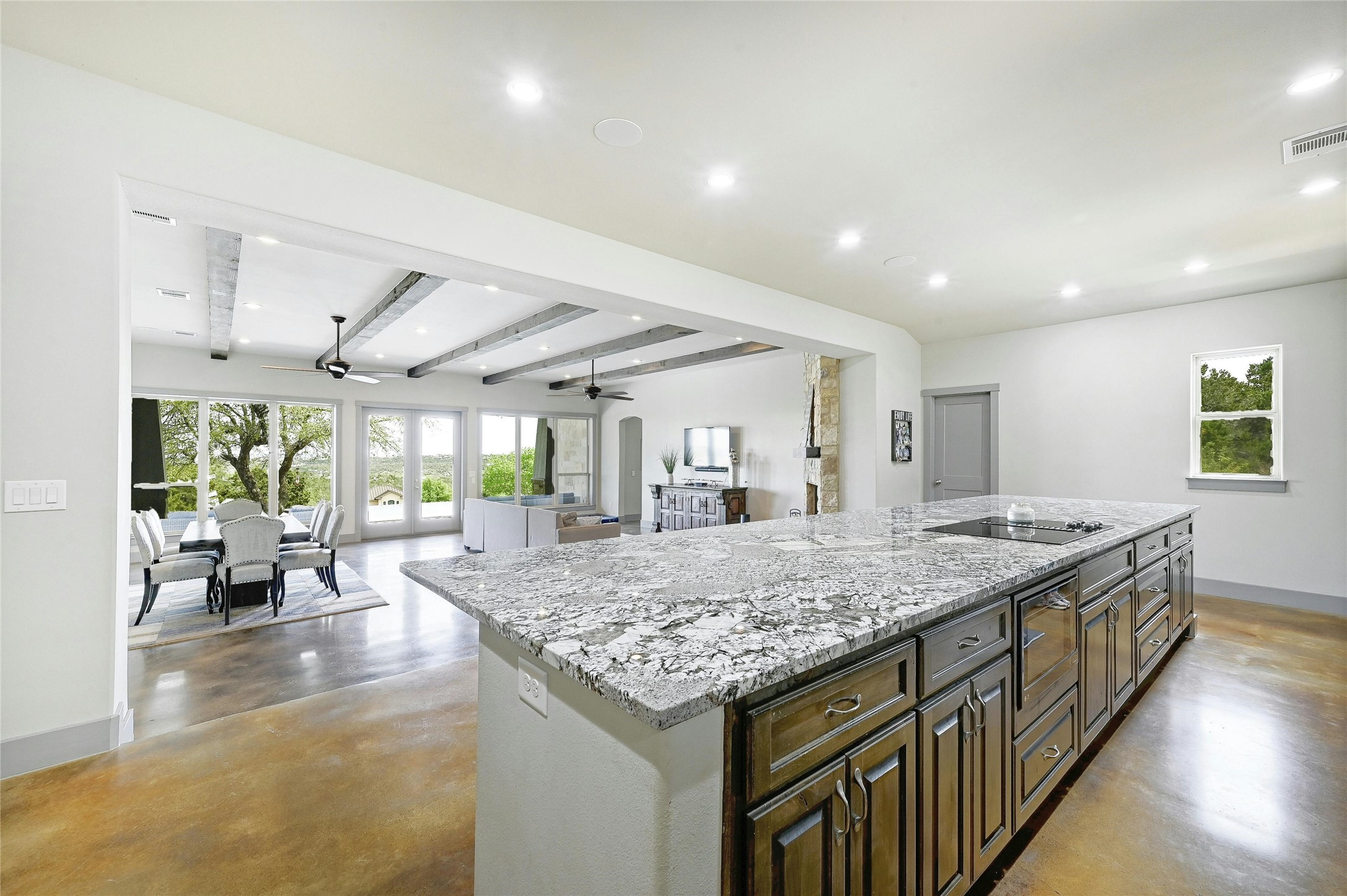 20117 Haystack Cove Spicewood, TX 78669 - Photo 4 of 40 Uniquely designed to keep the VIEWS front and center, this rear-facing home leaves a lasting first impression upon entry.