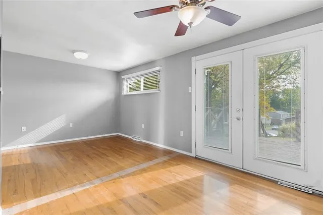 a view of a room with a large window