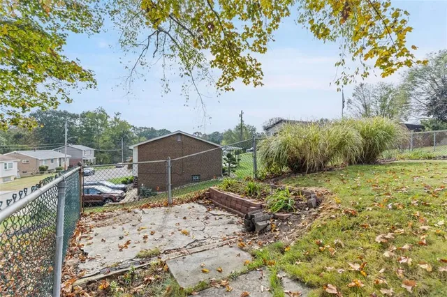 a view of balcony with wooden floor