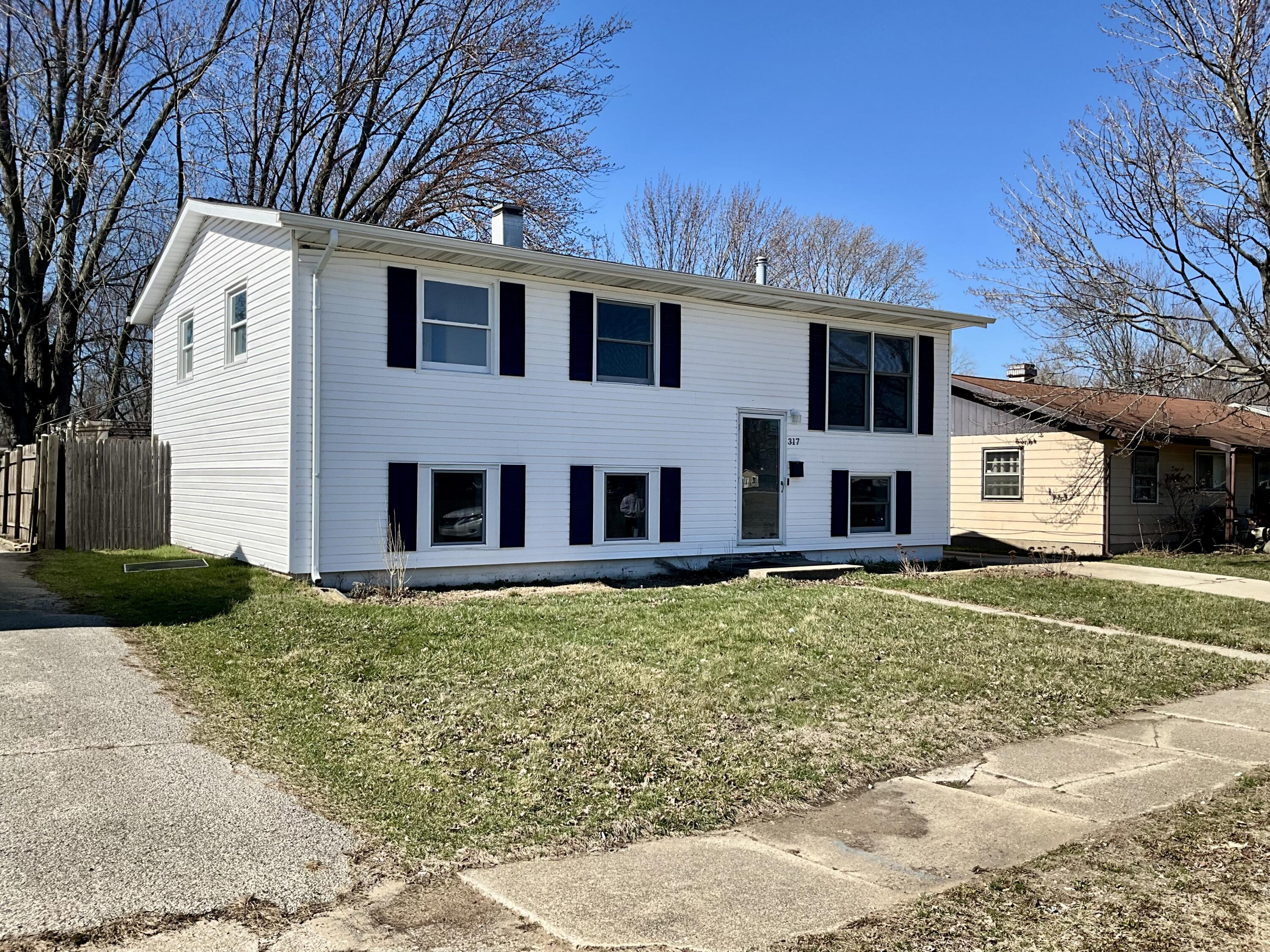 317 Redpath Avenue Michigan City, IN 46360 - Photo 2 of 40 a house view with a garden space
