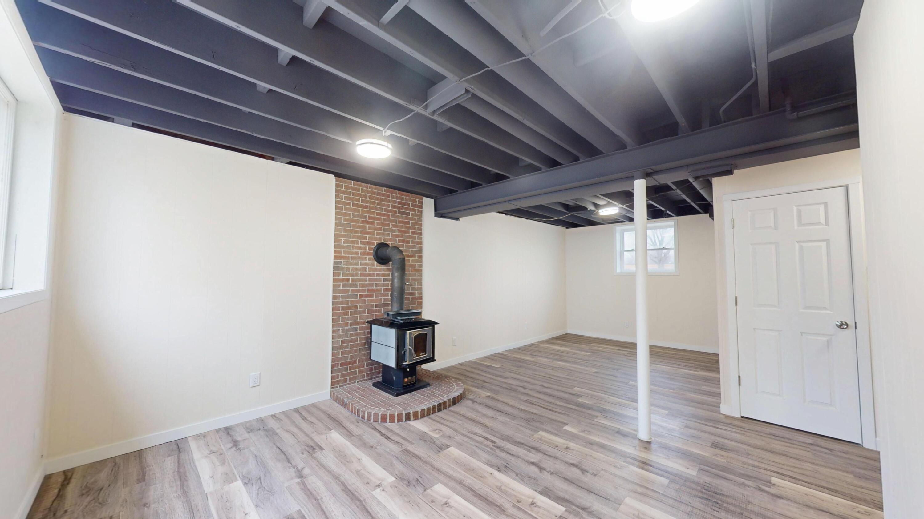 317 Redpath Avenue Michigan City, IN 46360 - Photo 24 of 40 a view of empty room with wooden floor