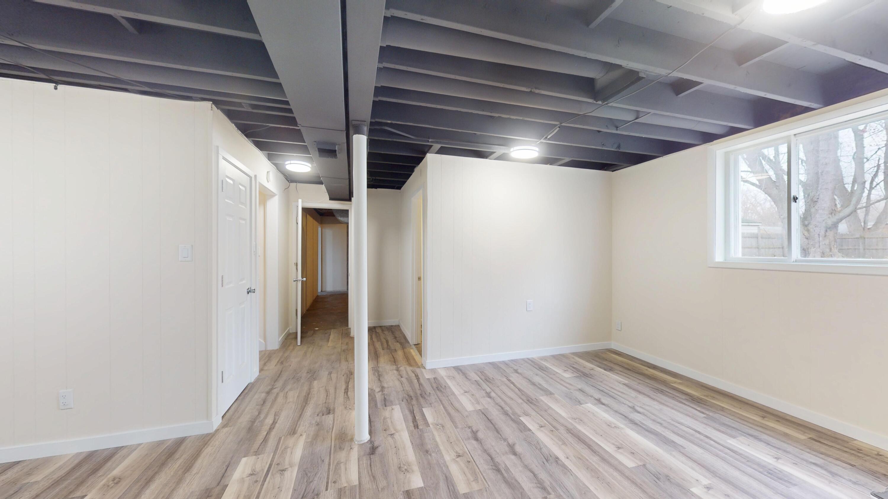 317 Redpath Avenue Michigan City, IN 46360 - Photo 26 of 40 a view of hallway with wooden floor
