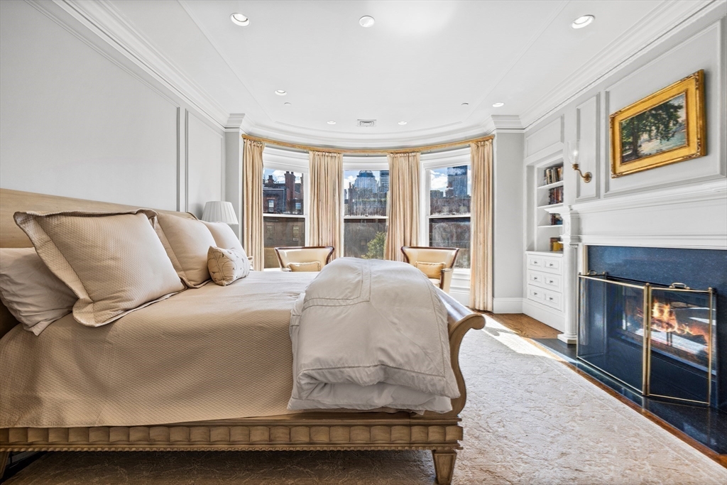 348 Beacon Street, Unit 4 Boston, MA 02116 - Photo 21 of 35 a living room with furniture and a fireplace