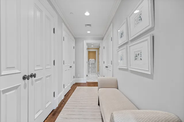 a spacious bathroom with a glass shower door and a bathtub