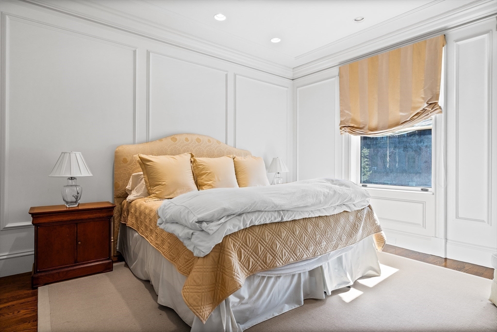 348 Beacon Street, Unit 4 Boston, MA 02116 - Photo 28 of 35 a bedroom with a bed and window