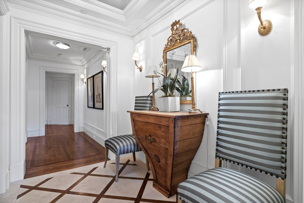 348 Beacon Street, Unit 4 Boston, MA 02116 - Photo 3 of 35 a dining room with furniture and wooden floor