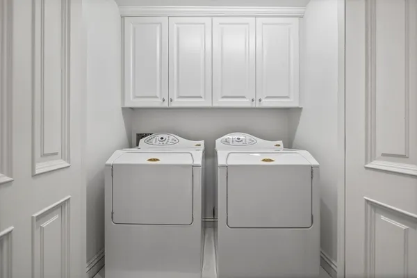 a view of a cars parked in front of a house