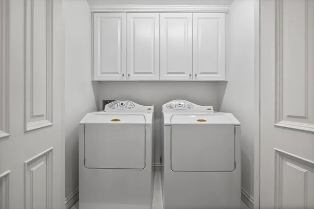 a view of a cars parked in front of a house