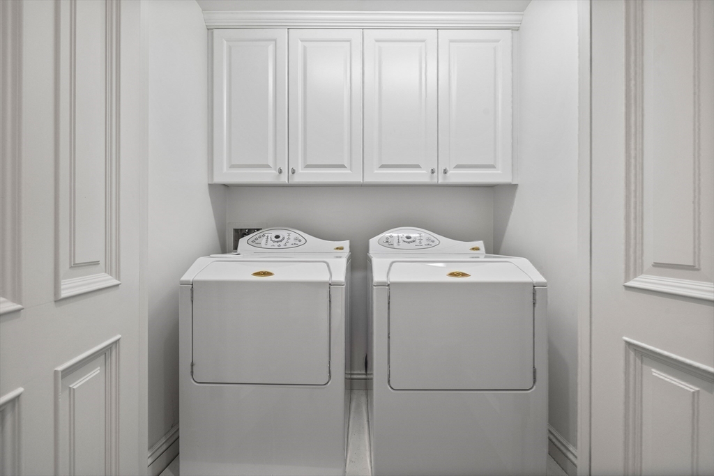348 Beacon Street, Unit 4 Boston, MA 02116 - Photo 32 of 35 a utility room with dryer and washer