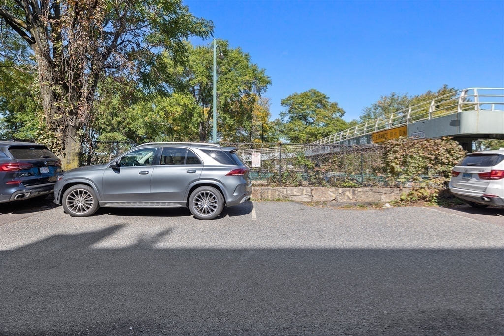 348 Beacon Street, Unit 4 Boston, MA 02116 - Photo 33 of 35 a view of a cars parked in front of a house