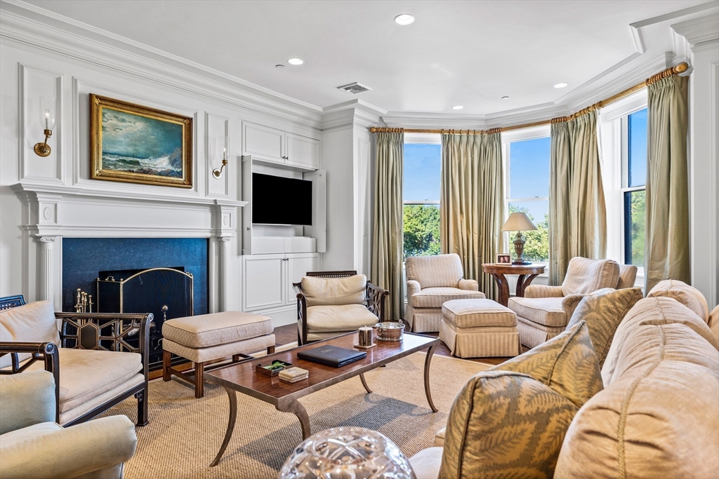 348 Beacon Street, Unit 4 Boston, MA 02116 - Photo 4 of 35 a living room with furniture fireplace and window